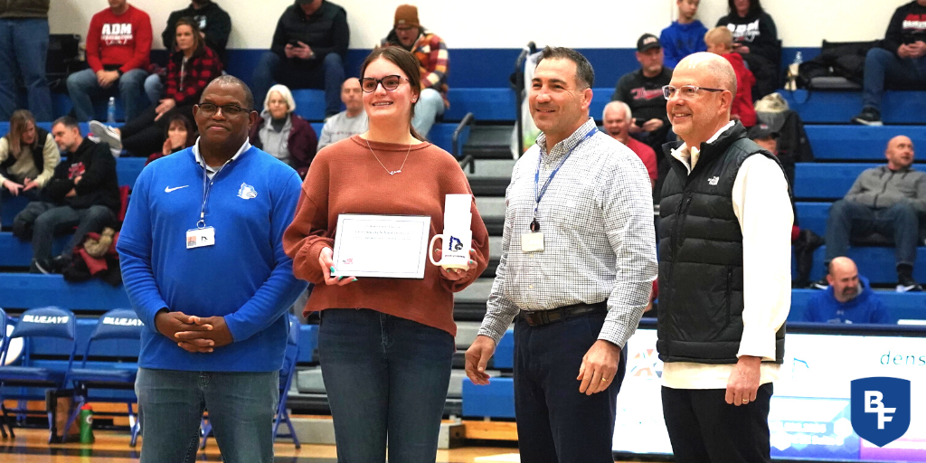 Elise Sanny recieving the Bluejay Way award during the January 19 basketball events/